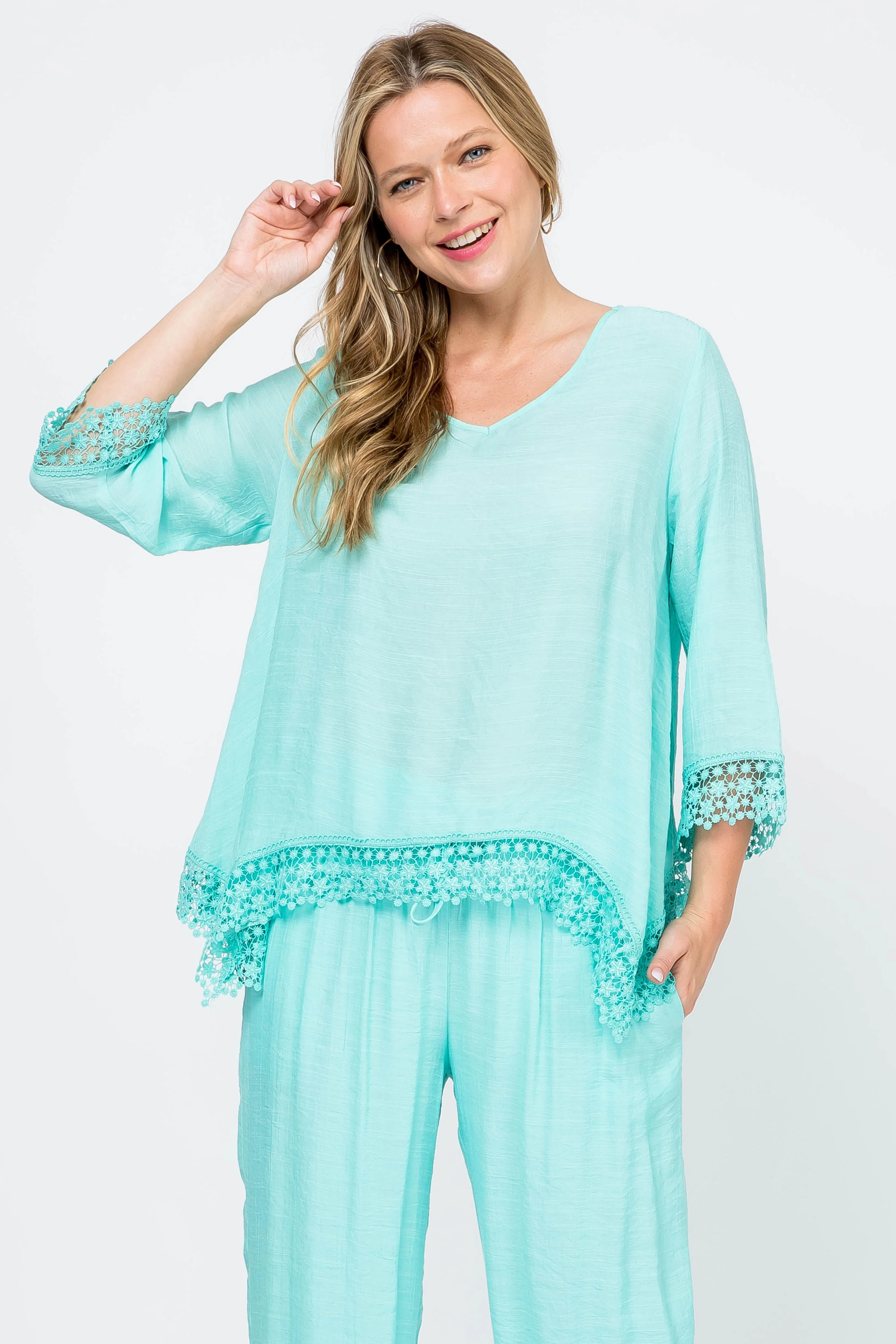 Women's Casual V Neck ¾ Sleeve Crochet Trimmed Shark Bite Hem Tunic Top
